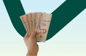 thai baht currency notes in hand